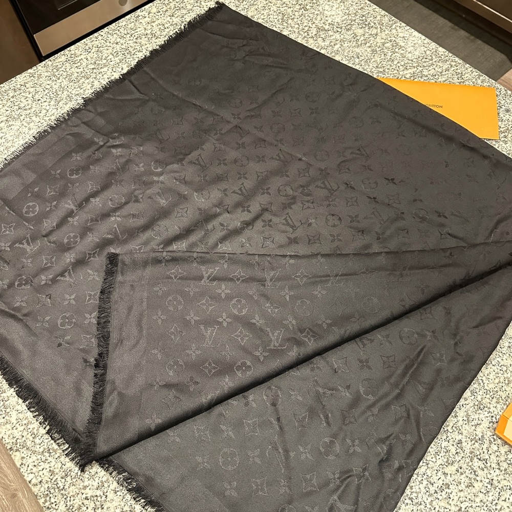 100% authentic black satin Louis Vuitton scarf. Purchased in Saudi Arabia